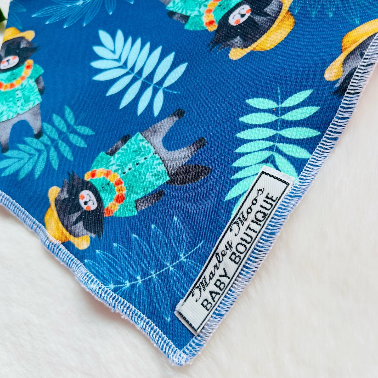 The Blue Hawaiian Raccoon Baby Bib