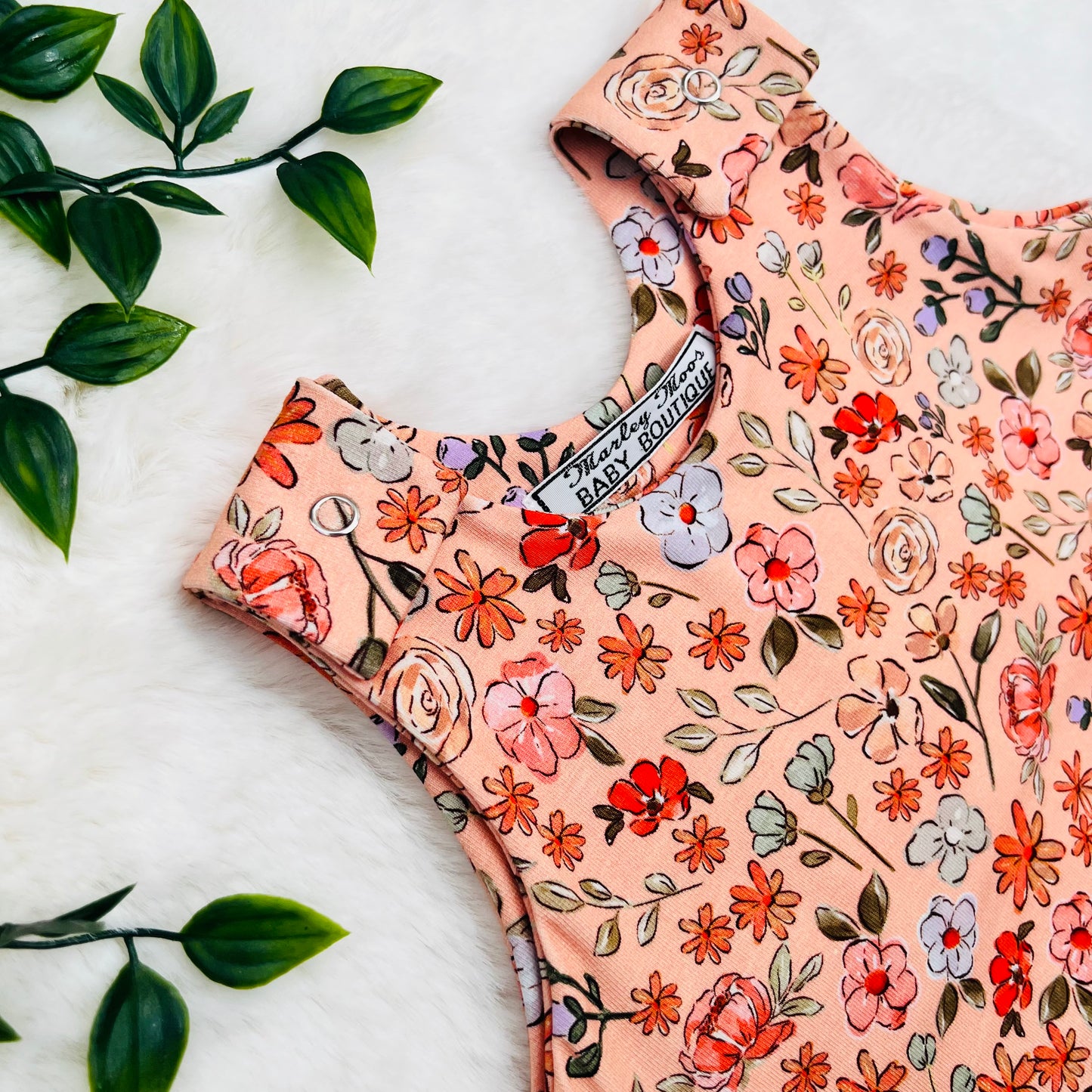 The Coral Ditsy Floral Romper